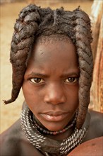 Himba girl with typical hairstyle, Omuramba, Kaokoland, Kunene, Namibia, Africa