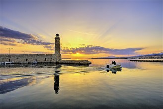 Morning light, sunrise, Venetian harbour, Venetian lighthouse, back light, HDR, boat leaving