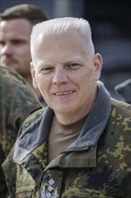 Here with Colonel Andre Hastenrath, leader of the preliminary command. By the fourth quarter of