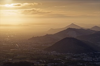 View of the densely populated Neapolitan region in the hazy evening light. San Felice a Cancello,