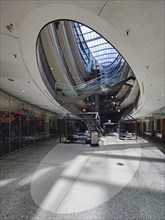 Stilwerk Düsseldorf, interior photo, elliptical atrium with surrounding galleries on five sales