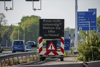 German-Dutch border at Emmerich-Elten, A3 motorway, signal board asks travellers to only make