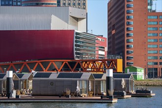 Holiday homes Wikkelboat, at Floating Rotterdam Rijnhaven, floating wooden houses, for rent, at Kop