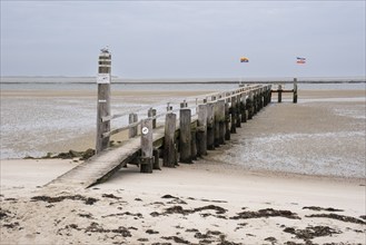 Pier at low tide, wooden jetty, Utersum, Föhr, North Sea island, North Frisia, Schleswig-Holstein,