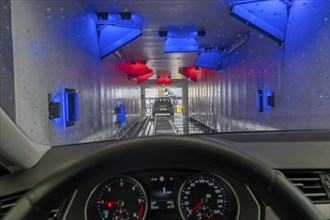 Car in an automatic car wash, car wash tunnel, drying