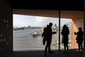 View from the visitor level of the Elbe Philharmonic Hall, tourists on the Elbe and Hamburg at the