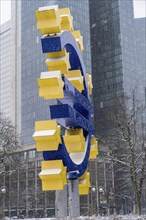 Winter in Frankfurt, euro sculpture at Willy-Brandt-Platz, snow-covered, Hesse, Germany, Europe