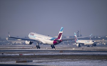 Discover Airbus A330-300 on landing approach and on the taxiway, at Frankfurt FRA Airport, Fraport,