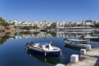 The village of Agios Nikolaos, in the eastern part of Crete, view over Lake Voulismeni, connected