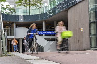 Entrance and exit of the bicycle car park at Utrecht Centraal station, Stationsplein, over 13, 000