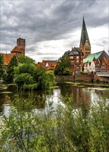 The water tower, river Ilmenau, Ratsmühle, St.Johanniskirche, city centre, old town of Lüneburg,