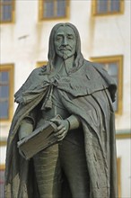 Monument to Duke Ernst I the Pious of Saxe-Gotha-Altenburg, sculpture with book and inscription,