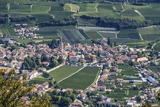 The village of Kaltern, on the South Tyrolean Wine Route, surrounded by vineyards and apple