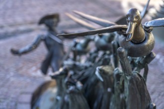 Münchhausen figure The ducks on a string at the Münchhausen fountain in Bodenwerder, Lower Saxony,