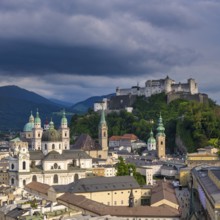 View of Salzburg's historic city centre with Hohensalzburg Fortress in the background under