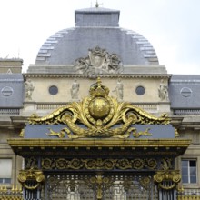 The wrought-iron, richly decorated portal of the Palais de Justice in Paris. Square format. The