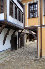 Historic buildings with overhanging upper storeys in historic old town area of Plovdiv, Bulgaria,