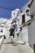 Typical white village Casares, houses, narrow alley on a hill, Route of the white villages, Malaga,