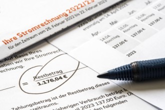 Symbolic image of electricity bill, billing of an electricity provider, additional payment due to