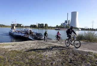 Cyclists have crossed the Rhine in Duisburg using the Walsum-Orsoy Rhine ferry, with the Duisburg