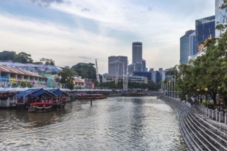 Clarke Quay in evening, coloured buildings and skyscapers