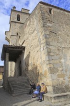 Old people sitting by church in Garganta la Olla, La Vera, Extremadura, Spain, Europe