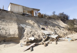 March 2018, Clifftop property collapsing due to coastal erosion after recent storm force winds,