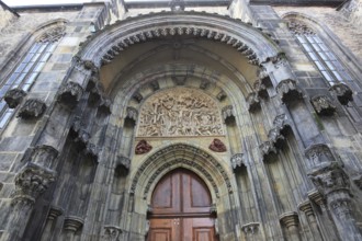 The north portal with tympanum of the Teyn Church, a Roman Catholic church of the Virgin Mary in