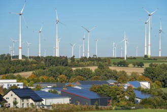 Wind farm above the village of Lichtenau, self-proclaimed energy town, houses with photovoltaic