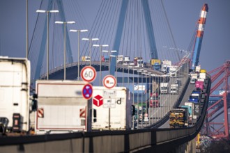 Traffic on the Köhlbrand Bridge in the port of Hamburg, spans the 325 m wide Köhlbrand, an arm of