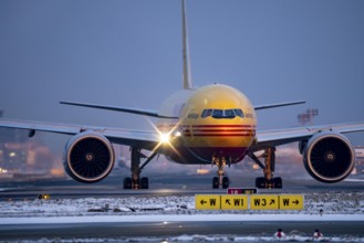 DHL, AeroLogic, Boeing 777F, on the taxiway to Runway West, Frankfurt FRA Airport, Fraport, in