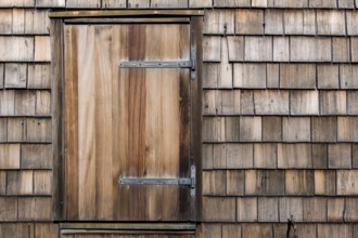 House facade with wooden shingles and windows, Garmisch-Partenkirchen, Upper Bavaria, Germany,