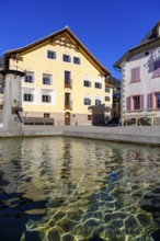 Fountain on the village square, Sent near Scuol, Engadin, Graubünden, Switzerland, Europe