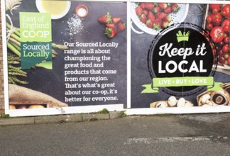 East of England Co-operative Society shop advertising boards hoardings, Woodbridge, Suffolk, UK