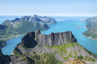 View over fjord Örnfjord, village Fjordgard, seen from mountain Grytetippen, island Senja, Troms,