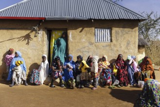 Women of a village community in Maraban Dare community, Plateau state have a break, 07.02.2024. The