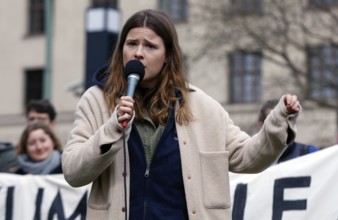 Luisa Neubauer speaks during a demonstration by Fridays for Future for compliance with climate