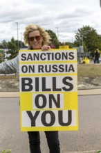 Protest at busy roundabaout, Martlesham, Suffolk, England, UK, opposition to sanctions on Russia