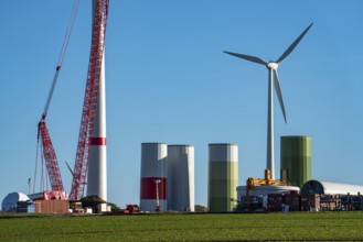 Construction site of a new wind turbine, modules of the tower, wind turbine from the manufacturer