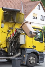 Waste disposal by specialised vehicles in a housing estate, Eckental, Central Franconia, Bavaria,