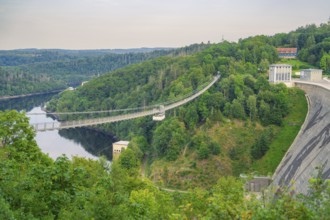 Dam with suspension bridge, surrounded by forest and water, Rappbode Dam, Harz Mountains, Germany,