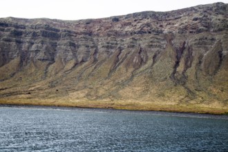 Steep gullied cliffs near Punta Fariones, Chinijo Archipelago, Orzola, Lanzarote, Canary Islands,