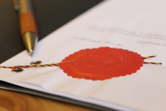 Notarised contract with red official seal