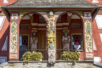 Historic town hall, Renaissance half-timbered house, portal above open staircase, colourful painted