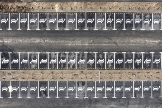 Aerial view of charging stations for electric cars at the Tesla Gigafactory in Grünheide, 28 01