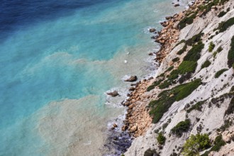 Steep coastline and turquoise-coloured water at Cap Blanc, Ibiza, Balearic Islands, Mediterranean,