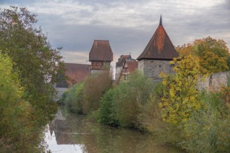 Towers of the medieval defence wall, around 1370, behind the Nördlinger Tor, in front the Wörnitz,