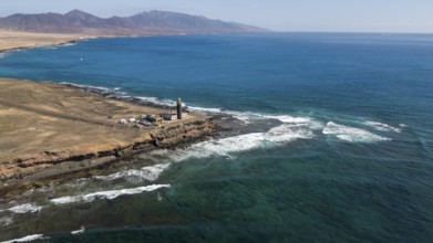 Aerial view of lighthouse Faro Punta de Jandia at southern tip of peninsula Jandia, in the