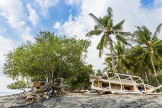 Locals at Magsit beach in Sengiggi, boat, wooden boat, palm beach, travel, tourism, sea, beach,