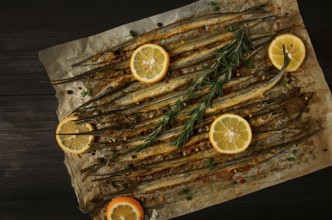 Fried fish, sargan, black sea pike, top view, close-up, no people